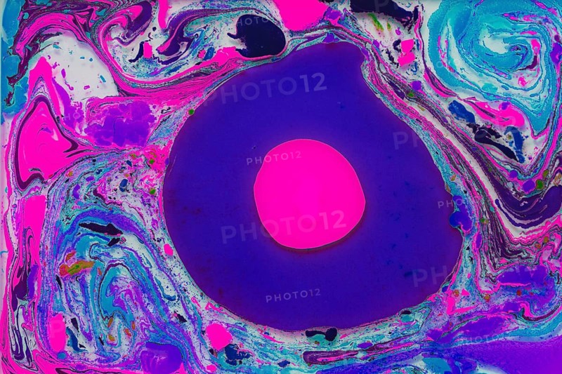 A dynamic abstract art piece featuring swirling patterns of blues, pinks, and purples around a bold pink central circle