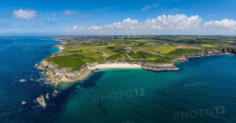Aerial view, panorama of Pointe Corsen, a cape at the westernmost point of continental France on the Breton coast, on the right the beach Plage de Corsen, on the horizon the village of Kervilon, Commune of Plouarzel, Finistère, Brittany, France