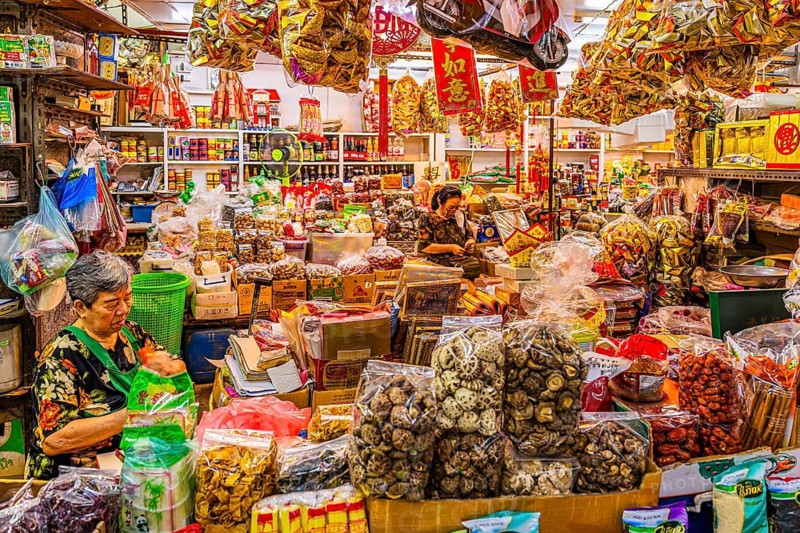 Customers in a grocery store, Kad Luang Warorod Market, Chiang Mai Thailand