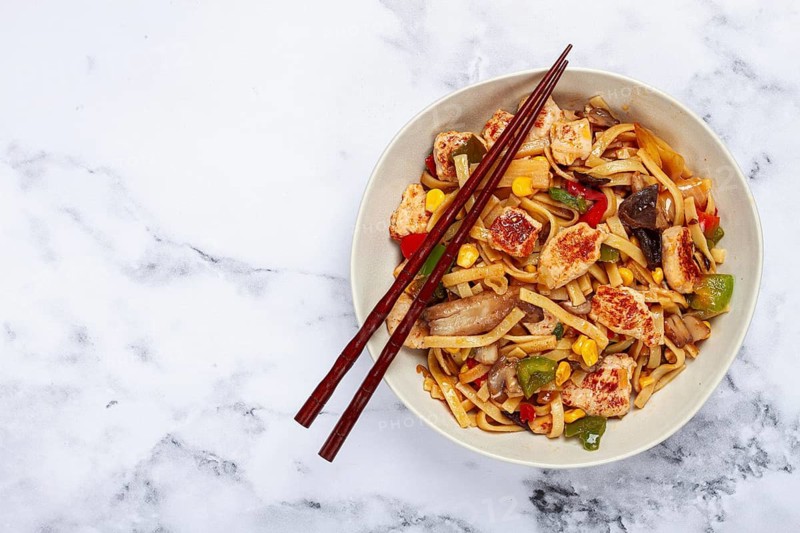 Fried noodles with chicken meat and vegetables, Bami Goreng, Indonesian dish, no people
