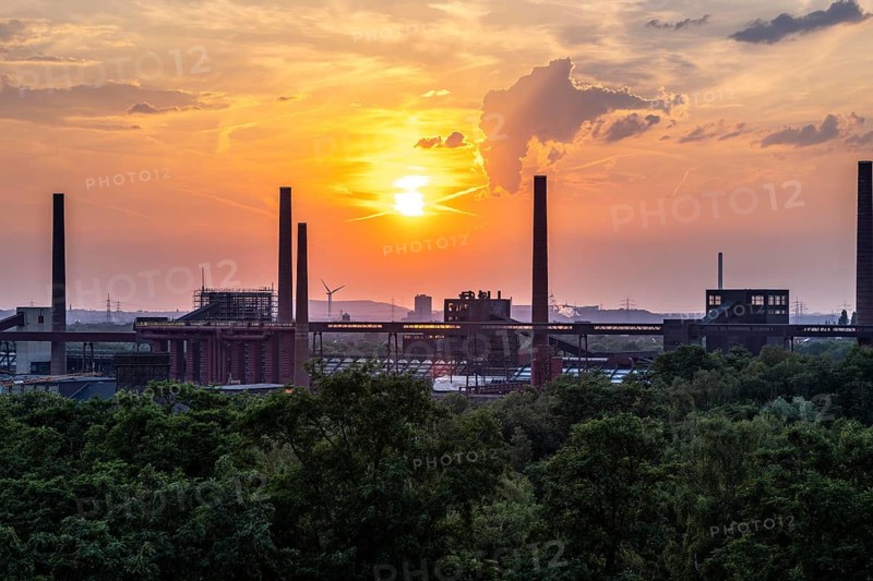 Sunset over the Zollverein coal mine coking plant, UNESCO World Heritage Site, chimneys and band bridges, Essen, tetrahedron on the Beckstraße heap in Bottrop, wind turbine in the city port of Essen, gasometer of the active Prosper coking plant, North Rhine-Westphalia, Germany