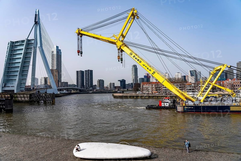 The Hebo Lift 10, supposedly the strongest crane ship in Europe, sails from the Rotterdam inland port to the Nieuwe Maas, through the flap bridge of the Erasmus bridge, up to 2200 tons of lifting capacity, the Netherlands