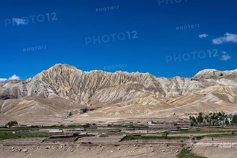 Mountainous landscape, erosion landscape and cultivated fields near Lo Manthang, Mustang, Upper Mustang, former kingdom, Himalayas, Nepal