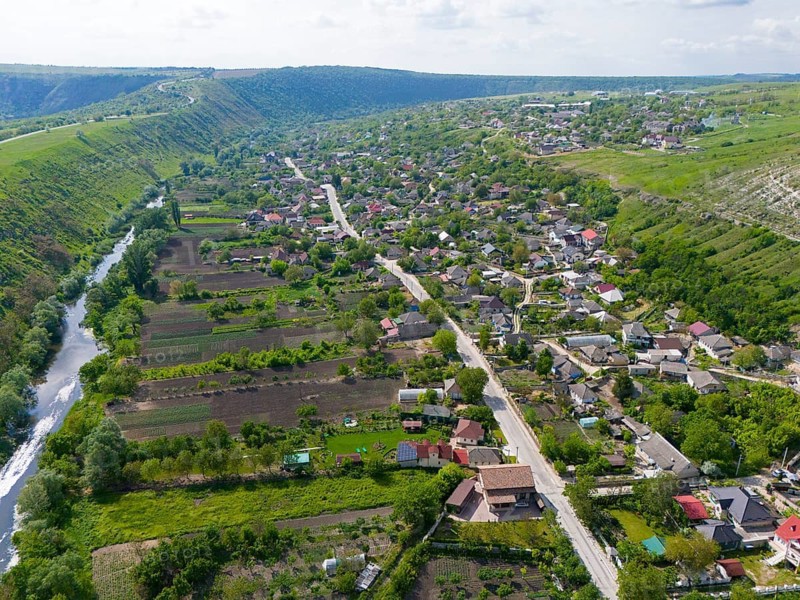 Rural settlement with a river and green hills in the area, aerial view, view of Trebujeni, Raut River, Raut, Old Orhei, Orheiul Vechi, archaeological site, protected landscape area, Orhei district, Republic of Moldova, Moldova