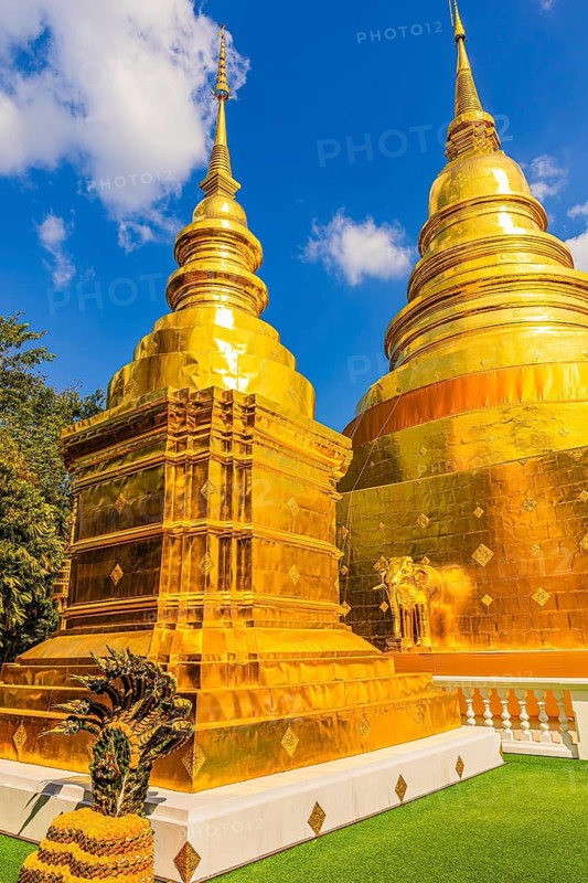 Gilded temple towers, chedi, stupas, in the Wat Phra Singh Buddhist temple complex, Chiang Mai Old City Center, Chiang Mai Province, Thailand