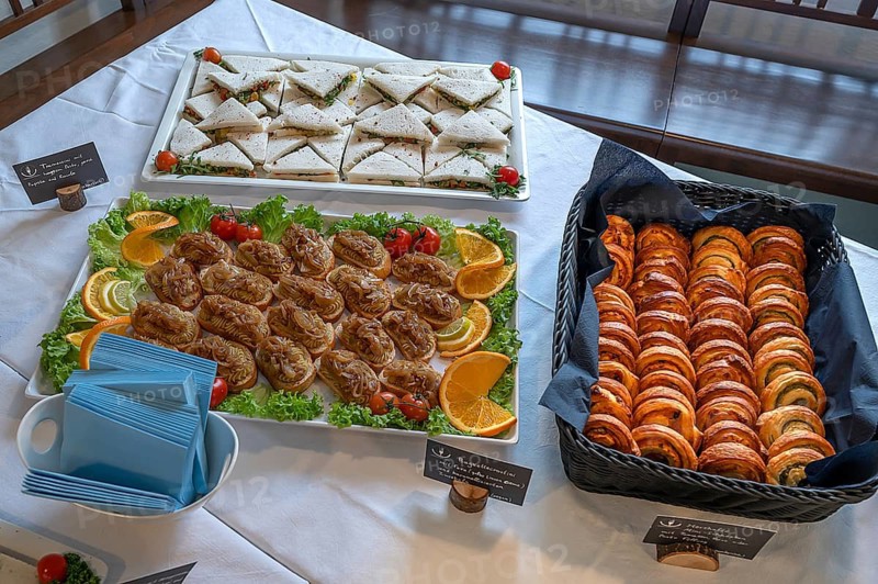 Various canapés and poppy snails decorated on plates, Bavaria, Germany