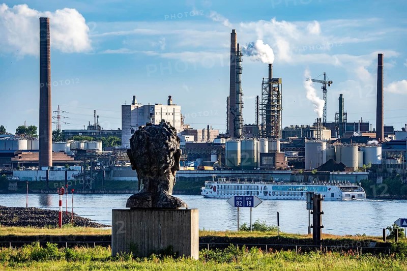 The former Venator chemical plant, since February 2026 it has been owned by the Frankfurt-based ICIG Group and operates under Sachtleben Functional Additives GmbH, the plant produces nanoparticles, for a wide variety of uses, river cruise ship A-Rosa Aqua, on the Rhine, sculpture The Echo of Poseidon, on Mercator Island, by artist Markus Lüpertz North Rhine-Westphalia, Germany