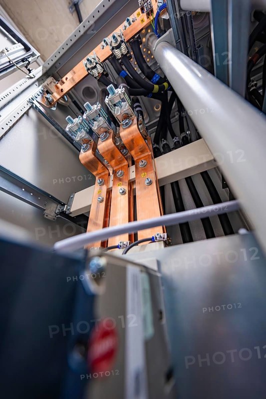 Close-up of copper terminals and cable connections in an electrical installation area, electrical system for PV system, industrial customers, Mühlacker, Germany
