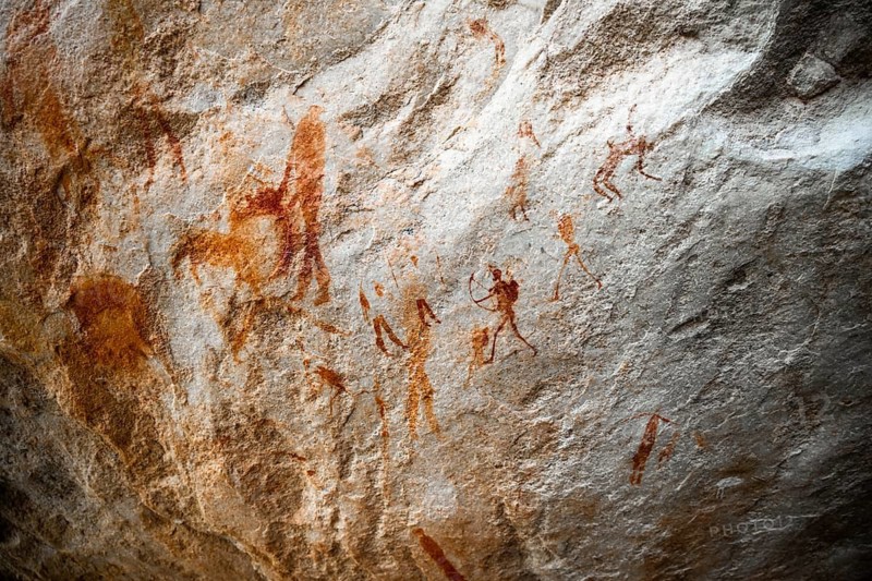 Prehistoric hunter with bow, ancient rock carving of the San, indigenous people of South Africa, Seville Rock Art Trail, Cedar Mountains, Clanwilliam, Western Cape, Republic of South Africa