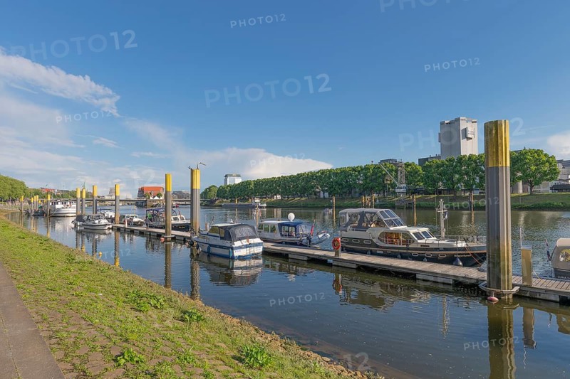 Pleasure boat harbour on the Weser promenade, Hanseatic city of Bremen, sports harbour, motor boats, boat berths, jetty, harbor basin, maritime flair, pier, leisure, water sports, boat traffic, navigation, port infrastructure, recreation, tourism, water edge, blue sky, dolphins, motor yachts, tree-lined avenue, shore, city-state, Germany