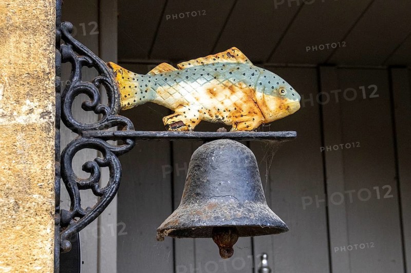 Fish figure, bell, Bibury, The Cotswolds, England, Great Britain