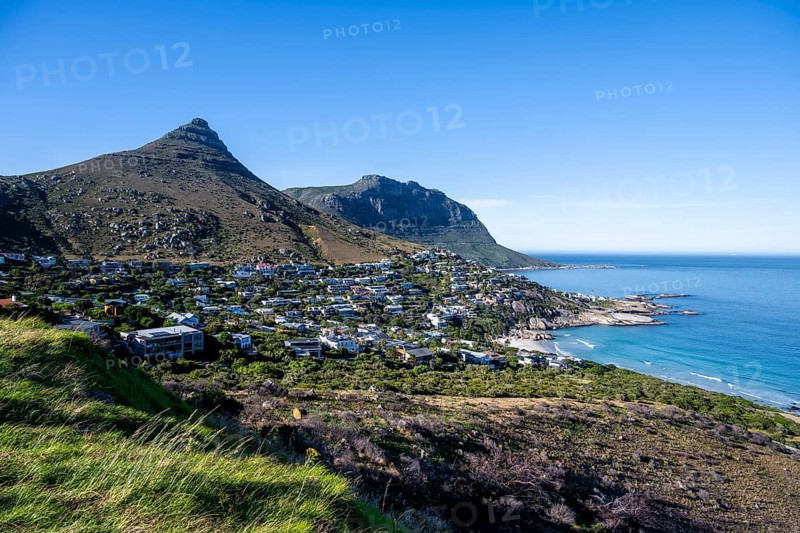 Sea Point and Lions Head, homes and mountains along a picturesque coastal bay with blue water, Eastern Cape, Cape Town, South Africa