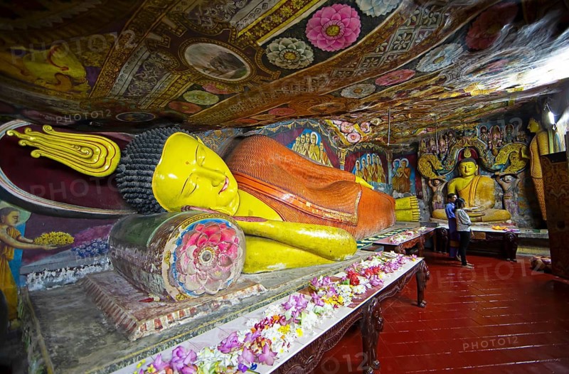 Reclining Buddha in Aluvihara Rock Cave Temple or Cave Monastery, Aluvihara, Matale, Central Province, Sri Lanka