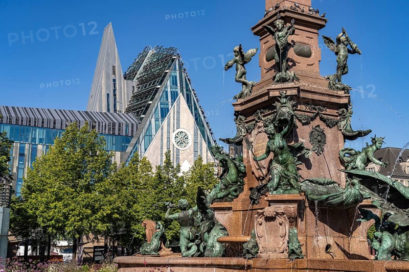 The Mende Fountain and the modern Augusteum of the University of Leipzig on Augustusplatz, Leipzig, Saxony, Germany