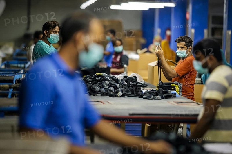Employees of Inter Market Knit Private Limited producing socks. Lahore, 22.08.2024. Photographed on behalf of the Federal Ministry for Economic Cooperation and Development