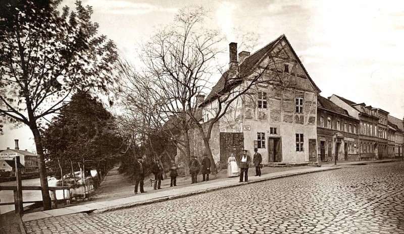 Brandenburg, Havel, street, Havel bridge, cobblestones, picturesque village street with people and old buildings from past times, around 1890