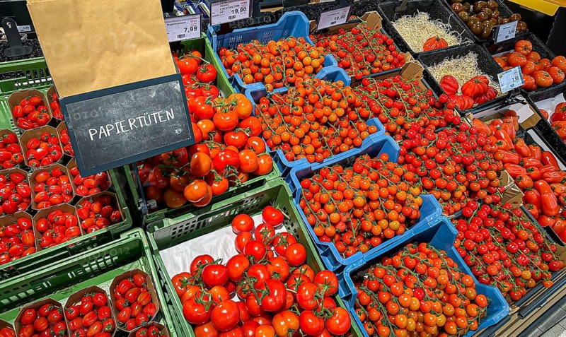 Fruit rack in a supermarket. Tomatoes in various varieties. diversity. Stuttgart, Baden-Württemberg, Germany