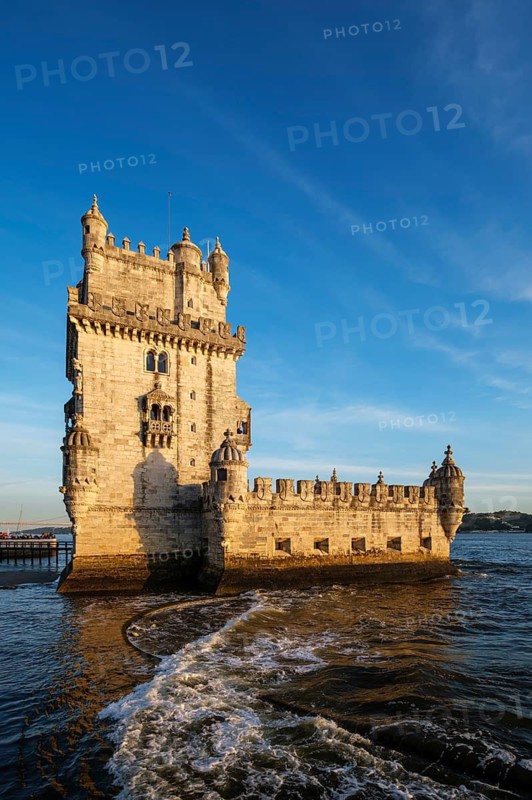 Belem Tower or Tower of St Vincent, famous tourist landmark of Lisboa and tourism attraction, on the bank of the Tagus River Tejo on sunset. Lisbon, Portugal