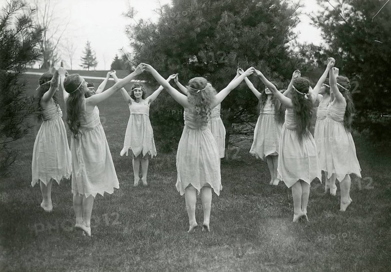 Nymphs at Spring, girl, dance, May Day, England, art deco, a group of woman dancing hand in hand outdoors, in a vintage style