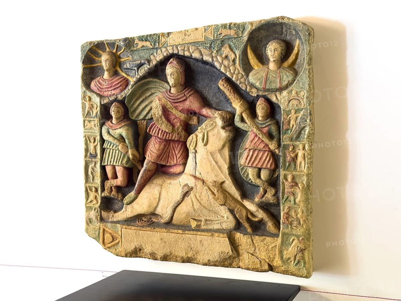 Copy of relief in Aguntum original in Bolzano depicting Mithras killing the bull from Mithraskult, museum of the ancient Roman city of Aguntum, Lienz, East Tyrol, Austria