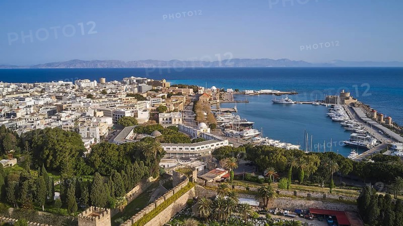 View of a beach marina with boats and a town in the background, harbour area, Rhodes Town, Rhodes, Dodecanese, Greek Islands, Greece
