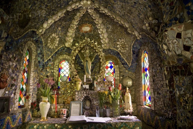 Altar, Little Chapel, Guernsey is possibly the smallest chapel in the world. It was built out of seashells and broken pottery by Brother Déodat who started work in March 1914