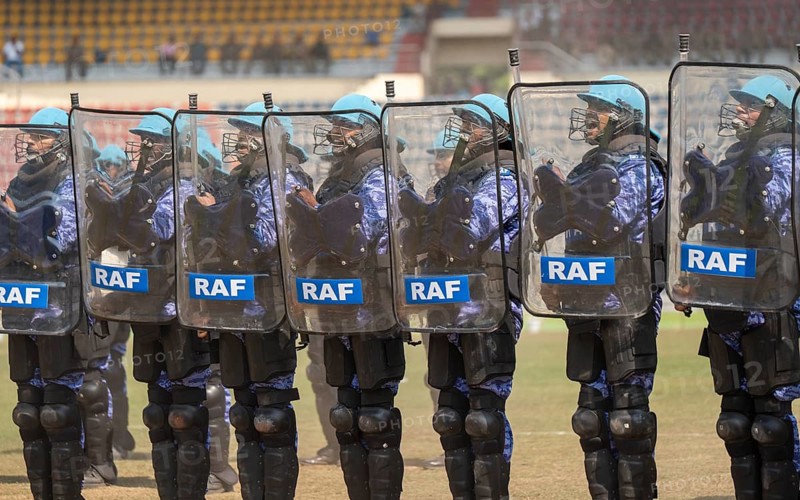 Personnel of the Rapid Action Force (RAF), a specialised unit of the Central Reserve Police Force, conduct an anti-riot drill with protective shields during the 87th Raising Day celebrations, on February 19, 2026 in Guwahati, India