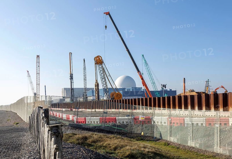 Preparatory construction work, Sizewell C nuclear power station, Sizewell, Suffolk, England, UK - Sizewell B dome in background March 2026