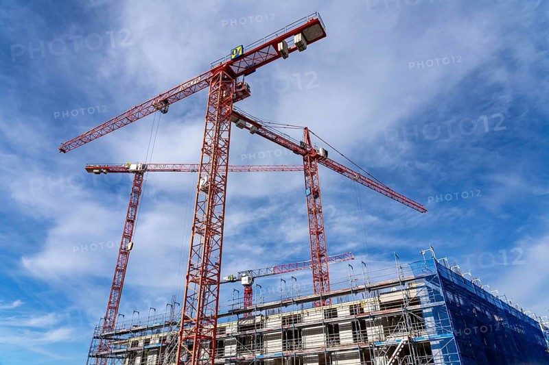 Large construction site, in the so-called Literaturviertel offices and flats between Sachsenstraße and Bert-Brecht-Straße, construction cranes, shell construction, in Essen, North Rhine-Westphalia, Germany