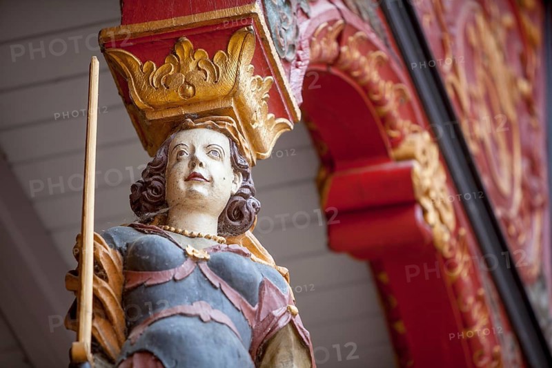 Woman with sword and libra, City hall stairs, symbol for justice, historic town hall, Duderstadt, Lower Saxony, Germany