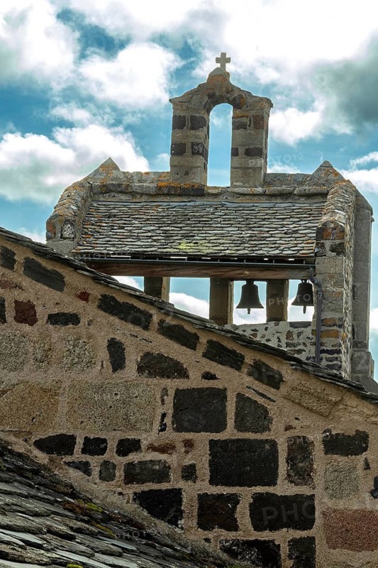 Bell tower of Saint Jean-Baptiste church in Le Monastier sur Gazeille, Haute-Loire, Auvergne-Rhone-Alpes, France