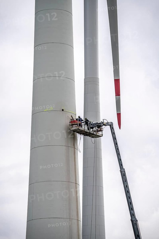 Preparation for the demolition of the tower of a 20 year old wind turbine, in the Werl wind farm, 5 old Enercon E-66 turbines are demolished, 2 new Siemens SG6.6-170 wind turbines replace them, the WTGs produce twice as much energy, 12 MW power, as the 5 old wind turbines, called repowering, Werl, North Rhine-Westphalia, Germany
