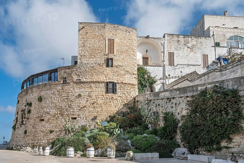 View of one of the towers of the Aragonese city wall in Viale Oronzo Quaranta, Ostuni, Apulia, Italy