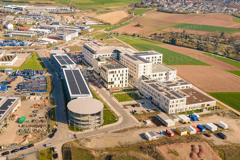 Extensive view of a hospital complex and surrounding landscape, hospital opening, Calw, Germany