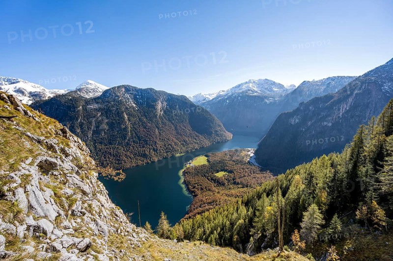 View of the Königssee from the Rinnkendlsteig mountain hiking trail, autumnal forest and snow-covered mountains, Berchtesgaden National Park, Berchtesgadener Land, Upper Bavaria, Bavaria, Germany