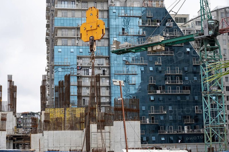 Batumi, Georgia. July 21st 2025. Cranes and construction work on modern high-rise hotel and apartment buildings in Batumi on the Black Sea coast of Georgia