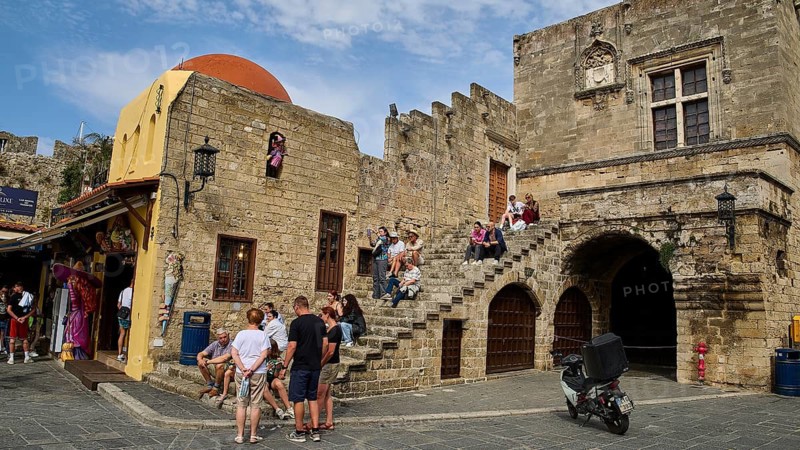 Hippocrates Square, Old Town with stairs and tourists, characterised by medieval architecture, Rhodes Old Town, Rhodes, Dodecanese, Greek Islands, Greece