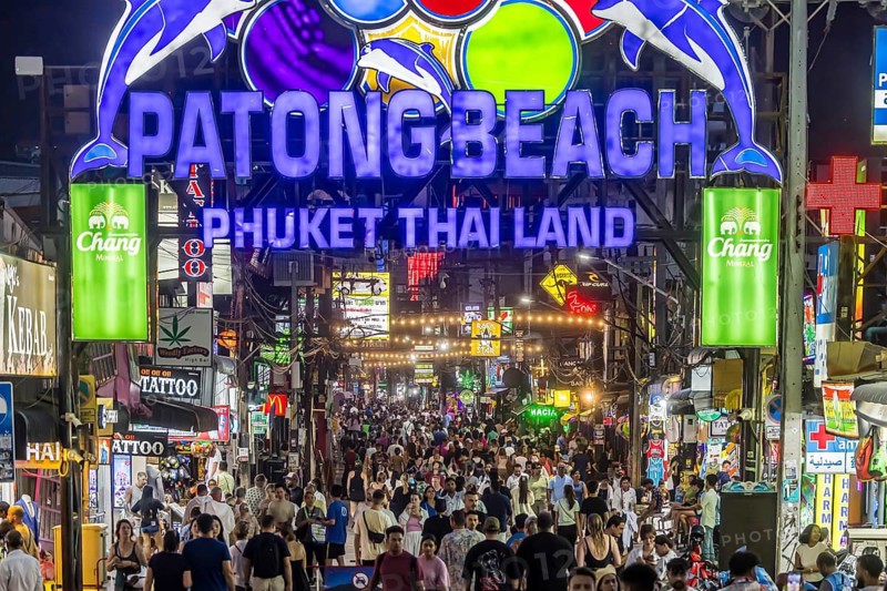 Crowds of people on Bangla Street in the evening. Nightlife on Bangla Walking Street with go-go bars, clubs, cannabis bars and extreme loudness. Patong, Kathu, Phuket Island, Thailand