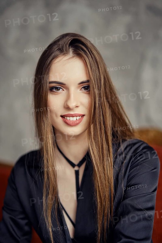 Closeup portrait of beautiful happy young woman