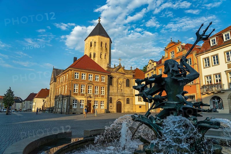 Neptune Fountain and Gau Church on the market square in Paderborn, North Rhine-Westphalia, Germany