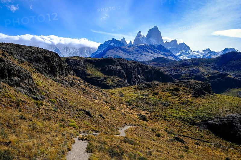 El Chaltén, Patagonia, Argentina, El Chaltén with a view of the Fitz Roy massif. El Chaltén offers the most direct access to the mountain massifs of Cerro Torre and Fitz Roy. The trekking resort is located 222 kilometres north of El Calafate, on the border with Chile