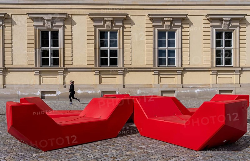 Red plastic seating elements, Humboldt Forum, Berlin, Germany