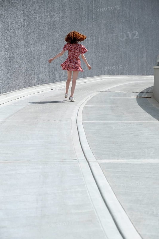 Portrait of a young woman, concrete desert, freedom, Emilia-Romagna, Italy