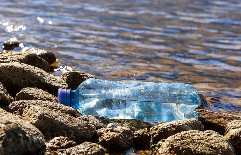 Environmental pollution, Plastic bottle washed up on the lake shore, Household waste, Austria
