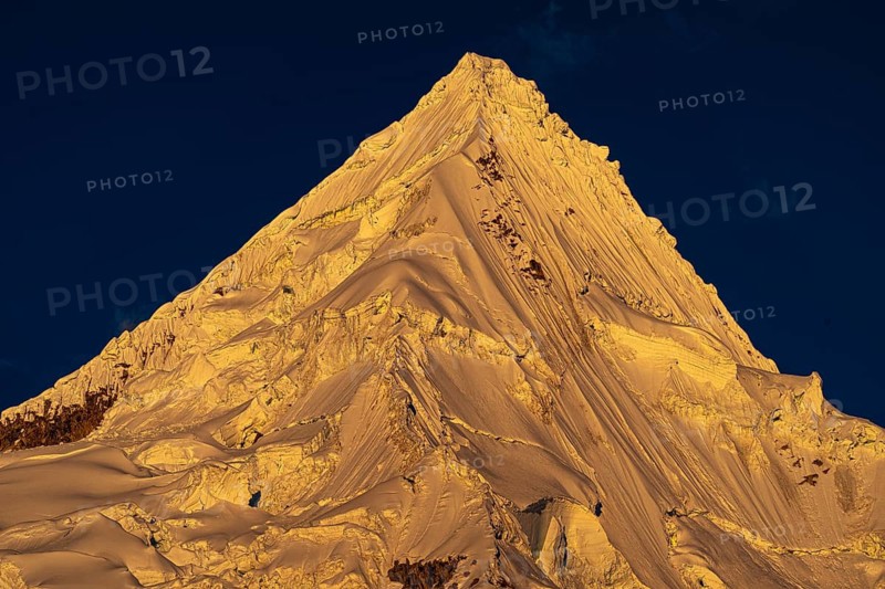 Alpamayo in the evening light, 5947 m, with the title most beautiful mountain in the world, Cordillera Blanca, Huascaran National Park, northern Peru, Peru, South America