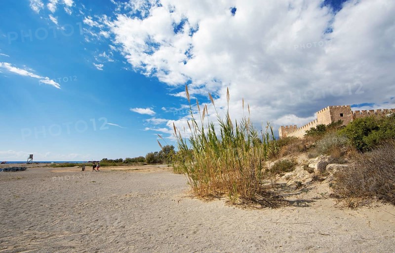 Beach in Frangokastello on the Libyan Sea, on the right the Venetian fortress, in the back the Lefka Ori or White Mountains, municipality of Sfakia, Chania Regional District, Crete, Greece