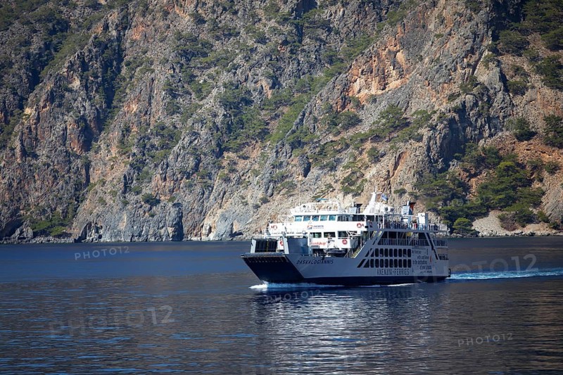 Ferry on the Libyan Sea with the Lefkia Ori or White Mountains in the background, Crete, Greece