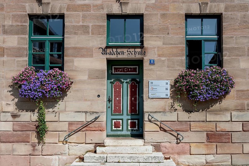 Entrance to the former girls' school, built in 1886, now a music school and youth centre, Kirchenstraße 11, Hiltpoltstein, Middle Franconia, Bavaria, Germany