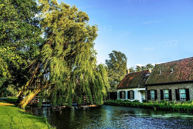 Walk along the Rotte, route from the modern city center to the green suburbs such as Hillegersberg or the Hoge Bergse Bos. Historic waterway leads past riverbanks, parks and the Prinsenmühle, Rotterdam, Netherlands