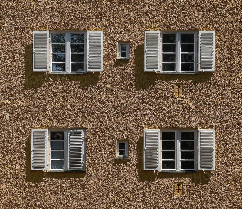 House wall with windows, borstei, heritage-protected residential development, Munich, Bavaria, Germany